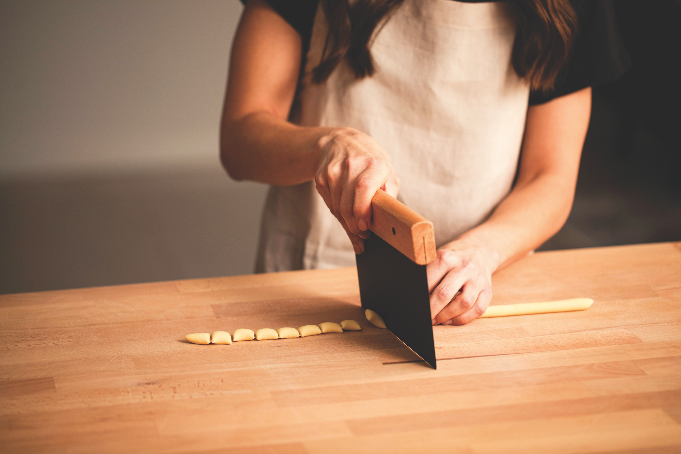hand-shaping pasta during workshop