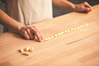 Image of Simone Agostino shaping fresh cavatelli semolina pasta shape. Image from her cookbook TOO.