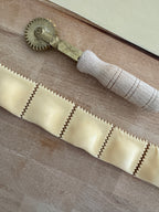 Freshly made ravioli on a board