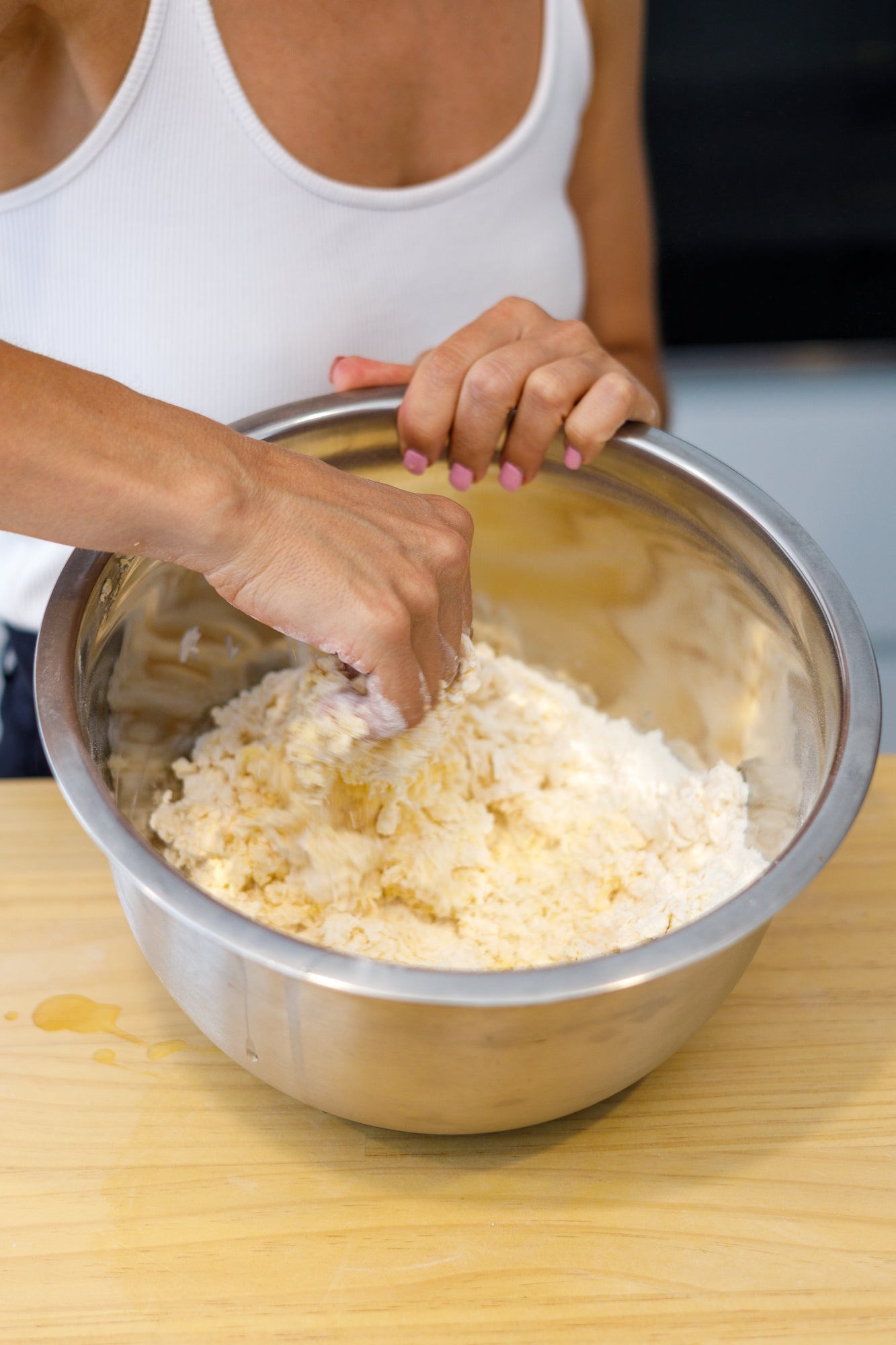 Picture of fresh pasta dough being mixed together in a bowl