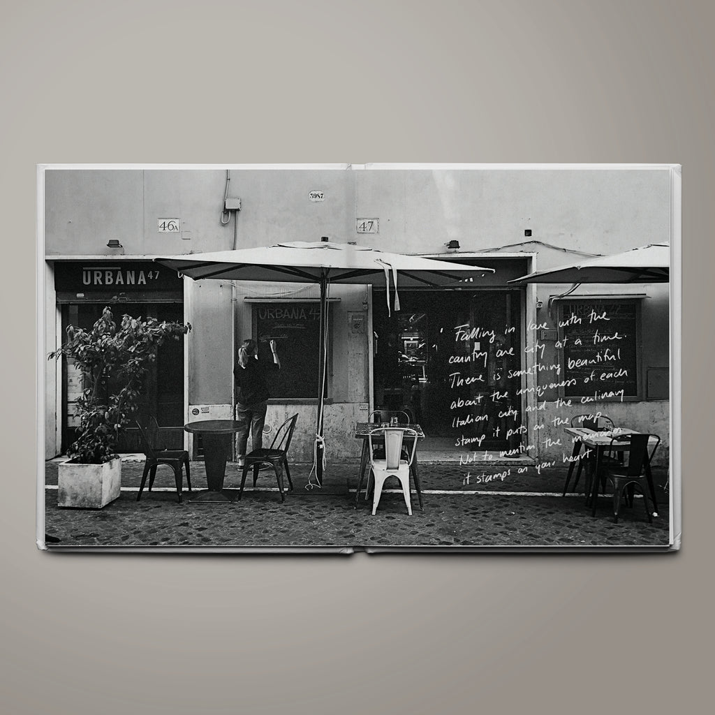 Street cafe scene in Rome featured in The Table of Us Cookbook, evoking the warmth and rhythm of Italian life.