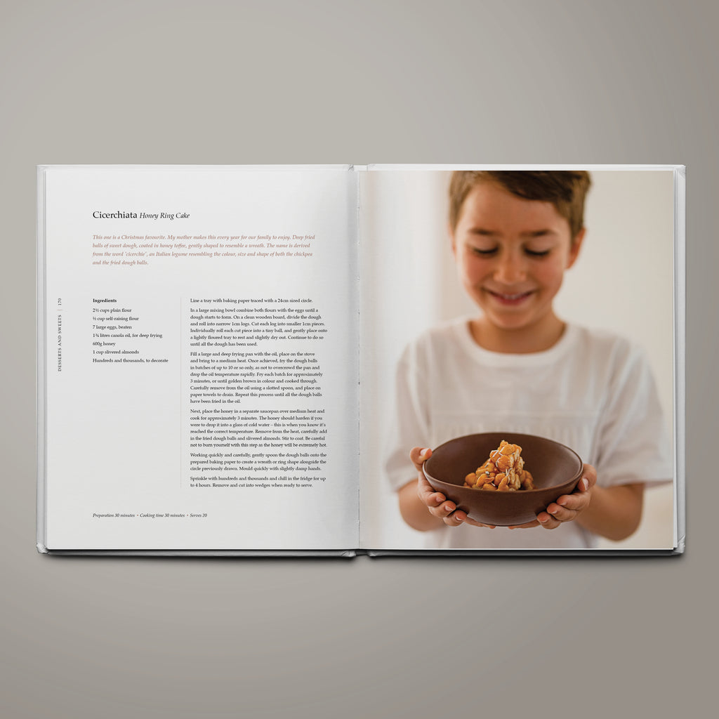 Recipe page for cicerchiata a traditional Italian honey ring cake from The Table of Us cookbook by Simone Agostino.