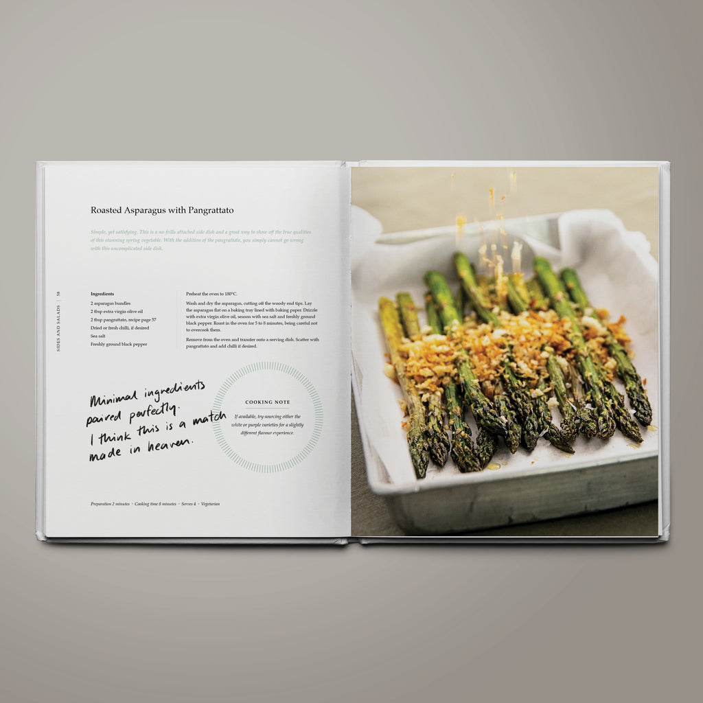 Recipe page for roasted asparagus with pangrattato from The Table of Us cookbook by Simone Agostino.